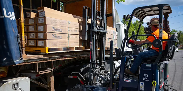 Man working with a forklift